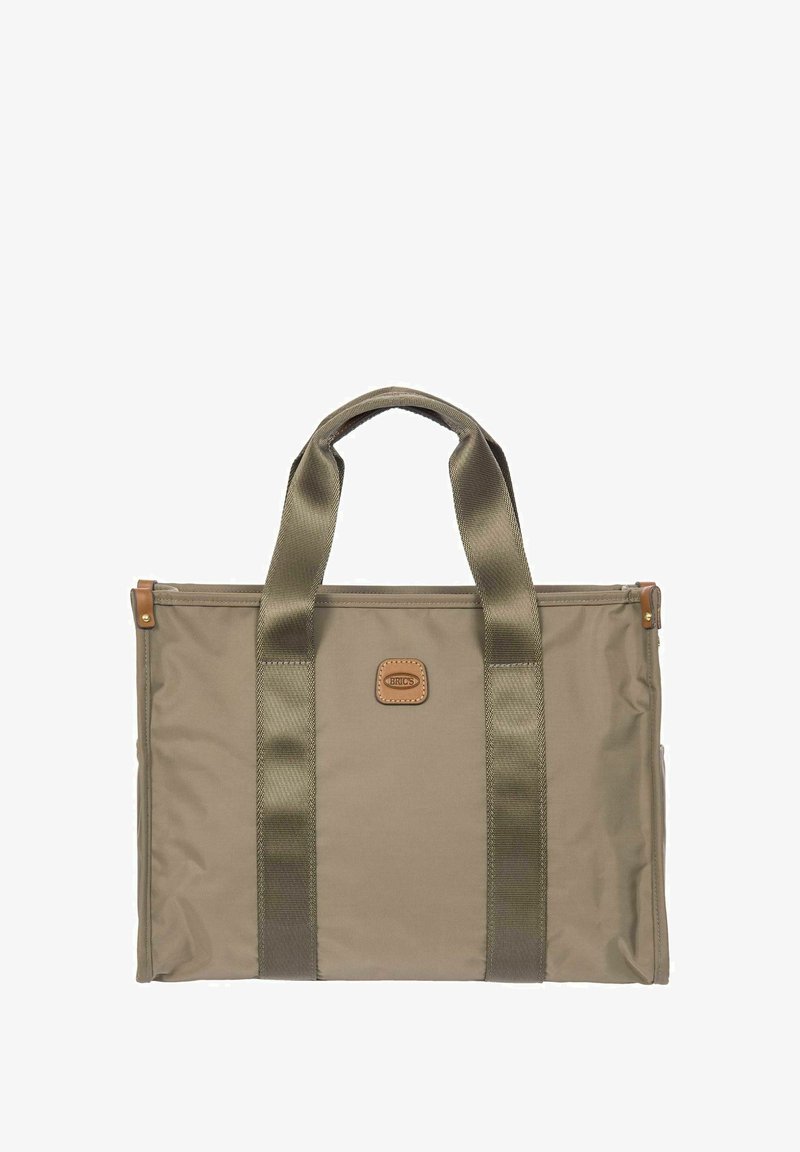 Sac fourre-tout rectangulaire beige avec des poignées vert olive et un petit patch en cuir centré sur le devant.