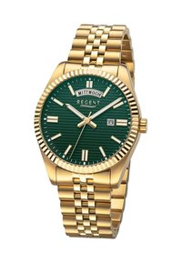 Montre bracelet dorée avec un cadran texturé vert, des index horaires argentés et un affichage de date. Comprend un bracelet en acier inoxydable et une lunette cannelée.