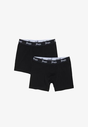 Deux paires de boxers noirs avec des ceintures élastiques noir et blanc imprimées avec "Utopia."