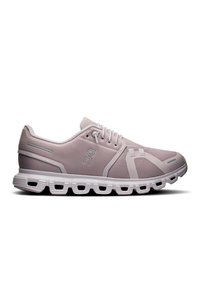 Baskets de sport légères en maille respirante de couleur violet clair, dotées d'une semelle rembourrée, affichant un design segmenté et un logo minimaliste.