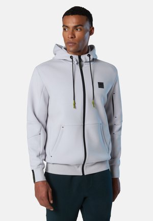 Light gray zip-up hoodie made of soft fabric, featuring black zipper, drawstrings with green tips, and two front pockets.