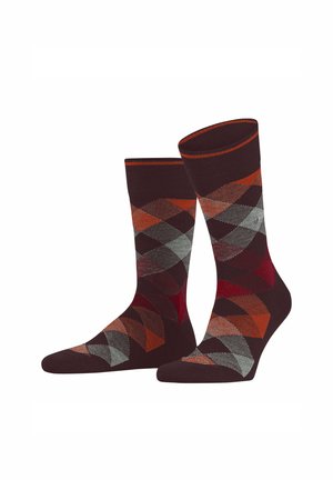 Brown socks with a colorful argyle pattern in red, gray, and orange shades, featuring ribbed tops and a smooth finish.
