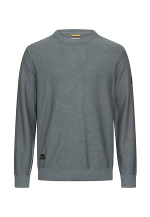 Grå crewneck-trøje med lange ærmer, ribbede manchetter og kant, samt lille sort mærke nær nederste venstre side.