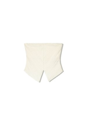 White lace crop top featuring a textured zigzag pattern and cutout detailing at the back. Short, wide sleeves with a fitted bodice.
