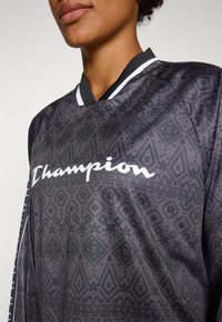 Champion SPORT HERITAGE LONG SLEEVES V NECK - Hosszú ujjú felső - black