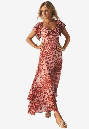 Robe maxi en tissu léger et translucide arborant un imprimé léopard rouge et rose, avec des manches froncées et un ourlet à volants. Accentué par un nœud à l'avant.