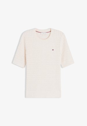 Cremefarbener Kurzarm-Pullover mit Zopfmuster, Rundhalsausschnitt und kleinem Tommy Hilfiger-Logo auf der linken Brust.