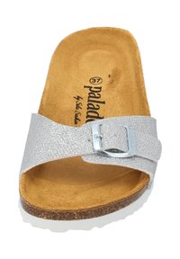 Silver glitter slide sandal with a wide strap and metallic buckle. Cork footbed and white rubber outsole. Brand 'Paladium' is visible inside.