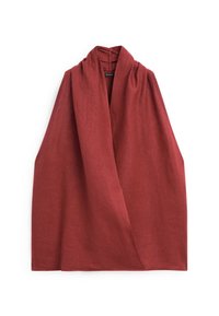 Manteau cache-cœur sans manches couleur rouille avec larges revers en tissu texturé, présenté à plat sur un fond blanc.