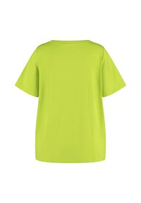 Short-sleeve, lime green t-shirt made of smooth cotton. Features a round neckline and a relaxed, loose fit with no visible logos or patterns.