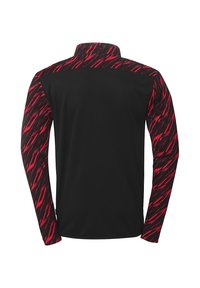 Langsleeve shirt met een effen zwarte romp en mouwpatronen in een scherp, rood zigzagdesign. Gemaakt van lichte, flexibele stof met een staande kraag.