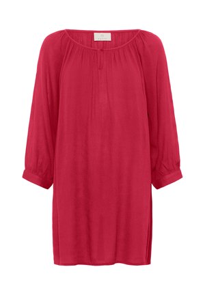 Sarkans, viegls blūze ar garām, saplacinātām piedurknēm un noapaļotu dekoltē. Tekstūrēts audums ar mīkstu drāzu. Nav redzamu aizdaru vai rakstu.