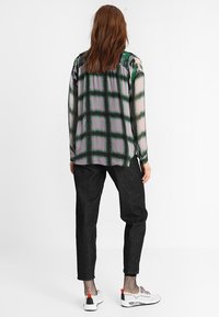 Diesel Jeans a sigaretta - rinsed denim