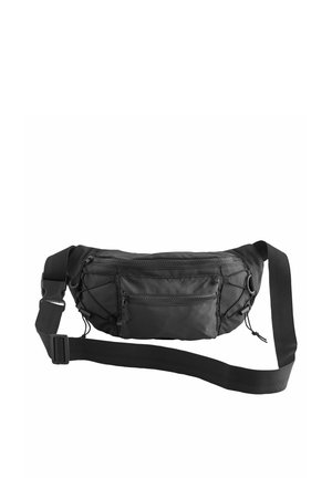 Black waist bag made of durable fabric with a textured surface. Features one main zip compartment and a front zip pocket, adjustable strap.