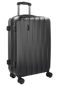 Valigia nera rigida con texture a coste verticali, manico retrattile, quattro ruote girevoli e chiusura con zip per un facile accesso.