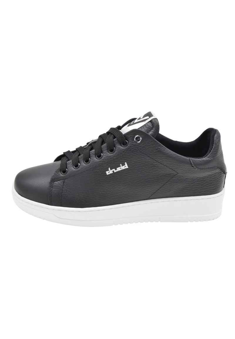 Black leather sneaker with a smooth texture, white rubber sole, six eyelets, and a logo detail on the side. Classic low-top design.
