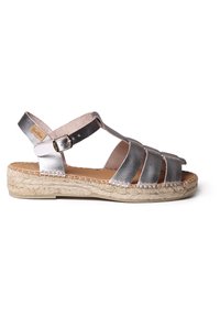 Hopeasaumaiset espadrillet sandaalit, joissa on kudottu juutti-pohja, avoin varvasmuotoilu ja säädettävä solkihihna. Useita etuhihnoja.