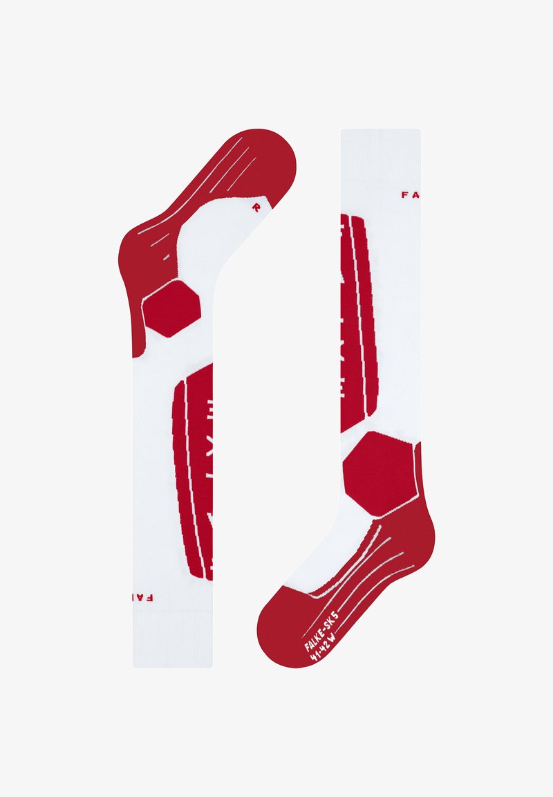 Calze al ginocchio bianche con accenti rossi. Presentano un design a forma di pallone da calcio, motivi esagonali e una texture a costine lungo la parte superiore.