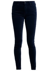 Mörkblå kordfløyels skinny jeans med framknäppning, fem fickor och en slät yta för extra komfort och stil.