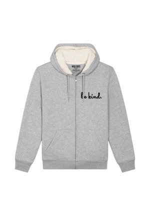 Felpa grigia con zip realizzata in un morbido tessuto con interni foderati in pile. Presenta due tasche laterali e la scritta "sii gentile" stampata in nero sul davanti.