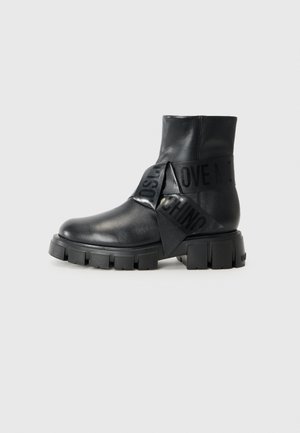 Platform ankle boots - black