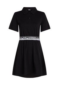 Svart polo klänning i bomull, med en figurnära bodice, korta ärmar och en kontrasterande vit elastisk midjeband med "KARL LAGERFELD"-logotyp.
