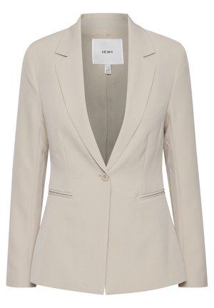Bežový oblekový blazer se zapínáním na jeden knoflík, klopovými límci, dvěma bočními kapsami a strukturovanými rameny. Hladká textilie.