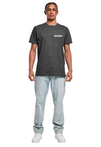 Merchcode UNFOLLOW  - Triko s potiskem - charcoal