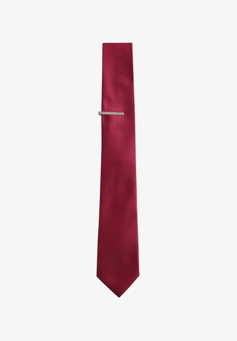 Red tie with a textured pattern, featuring a silver tie bar for secure fastening. Tapered shape with a pointed end.