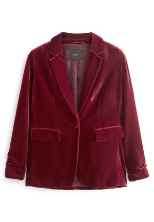 Blazer en velours bordeaux à un bouton avec revers crantés, deux poches avant à rabat et manches longues avec poignets retournés.