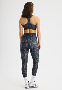 Röhnisch PRINTED HW - Tights - grey leo print