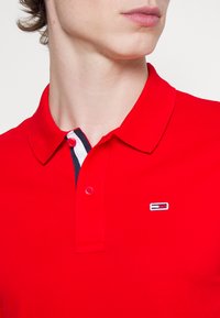 Tommy Jeans SLIM PLACKET - Polo - deep crimson