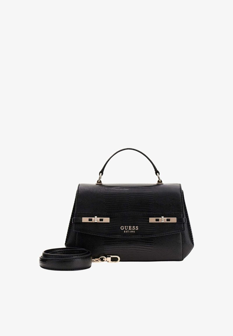 Sac à main Guess en cuir texturé noir avec poignée supérieure, ferrures argentées, logo sur le devant, et bandoulière détachable enroulée à côté.