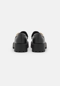 Monki Sapatos sem atacadores - black