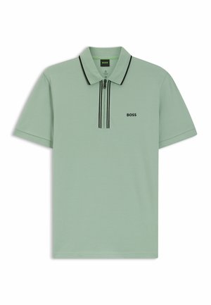 Polohemd in Minzgrün mit kurzen Ärmeln, einem Reißverschlusskragen und schwarzen Akzentstreifen. Mit einem kleinen schwarzen Logo auf der Brust.