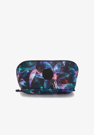 Sort kosmetikpung med et levende blåligt og lilla blomsterdesign, struktureret stof og et cirkulært logoaccent på forsiden.