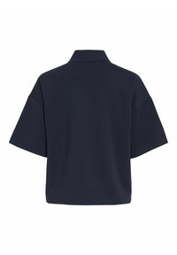 Camiseta de pulóver de manga corta en color navy con cuello tipo polo y un corte ancho. Fabricada en material suave con una textura lisa y uniforme.