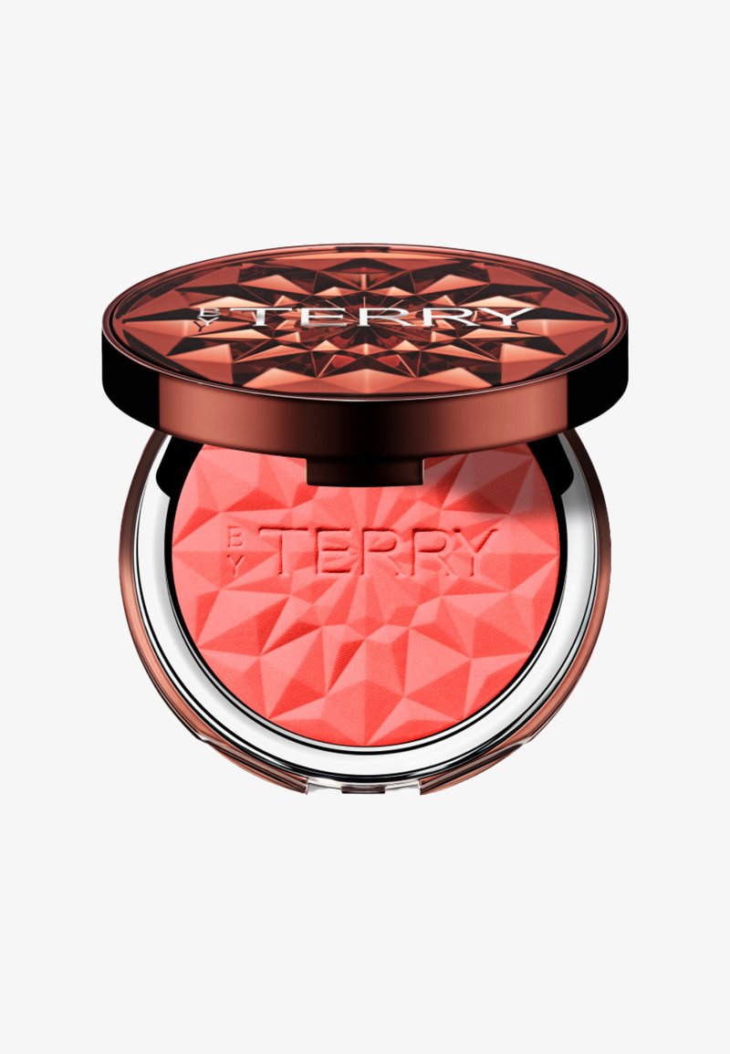 Runder Rouge-Compact mit einem kunstvollen, reflektierenden Golddeckel und einem strukturierten orange-roten Puderinnenraum, geprägt mit "BY TERRY."