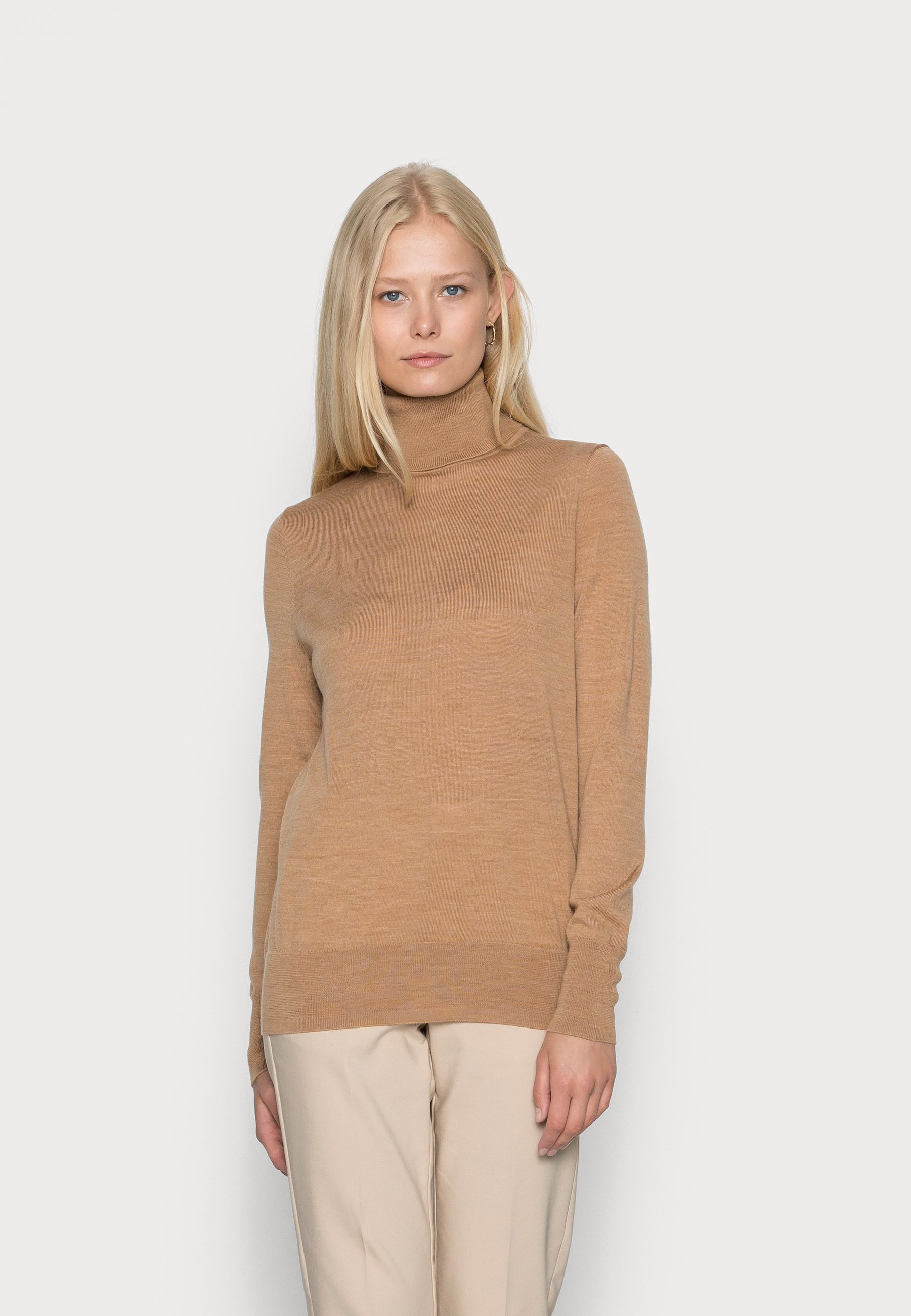camel turtleneck jumper