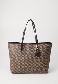 Brown patterned tote bag with black leather handles and a small black heart-shaped charm. Features a wide open top for easy access.