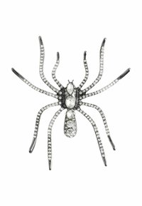 Broš s oblikom pauka ukrašen prozirnim rhinestones na metalnom okviru, s osam detaljno izrađenih nogu i segmentiranim tijelom.