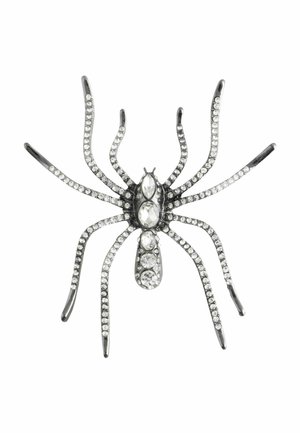 Broš s oblikom pauka ukrašen prozirnim rhinestones na metalnom okviru, s osam detaljno izrađenih nogu i segmentiranim tijelom.