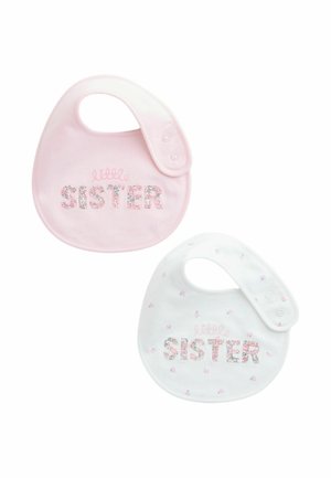 Two baby bibs: one pink, one white. Both feature "little SISTER" text. Pink bib has floral letters; white has small floral patterns. Soft fabric.