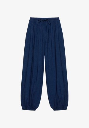 Pantalon ample bleu marine avec taille élastique, cordon de serrage et bas élastiqués aux chevilles.