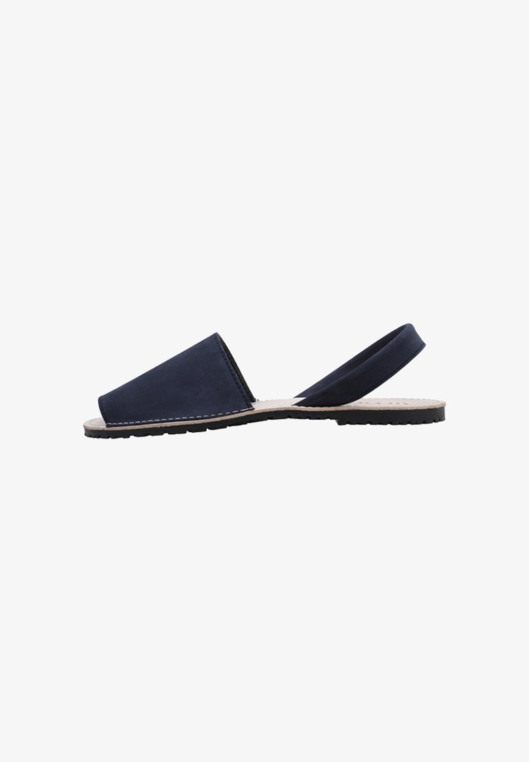 Navy blue slingback sandals with a soft suede upper, open toe, and beige rubber sole with textured tread for grip.