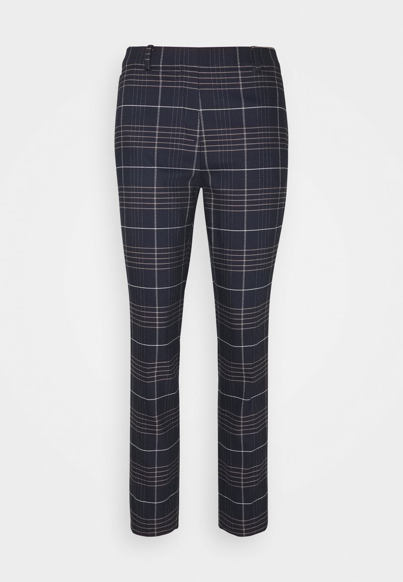 Pantalon slim bleu marine avec motif à carreaux blancs et marron clair, poches latérales et passants de ceinture.