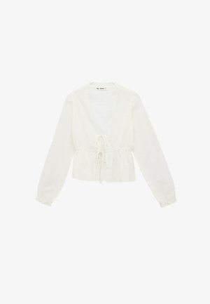 Witte blouse met lange mouwen, frontale striksluiting, oogjesborduursel, geraffineerde taille en elastische manchetten.