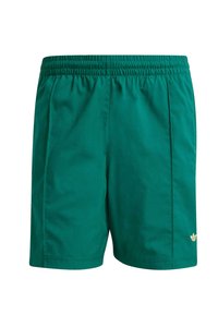 Grønne sports shorts med elastisk talje, to sidelæg og en lille guld logo detalje i nederste højre hjørne. Glat tekstur.