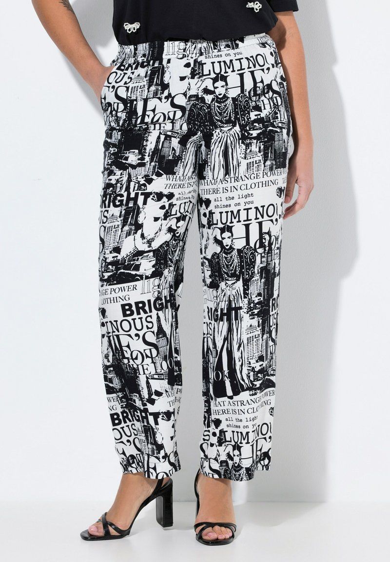 Zwart-witte broek met wijde pijpen, voorzien van een grafische print van tekst en afbeeldingen. Gemaakt van stof met een gladde textuur. Elastische tailleband.