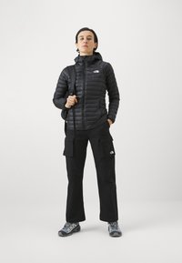 The North Face BETTAFORCA HOODIE - Jakna ispunjena paperjem - black
